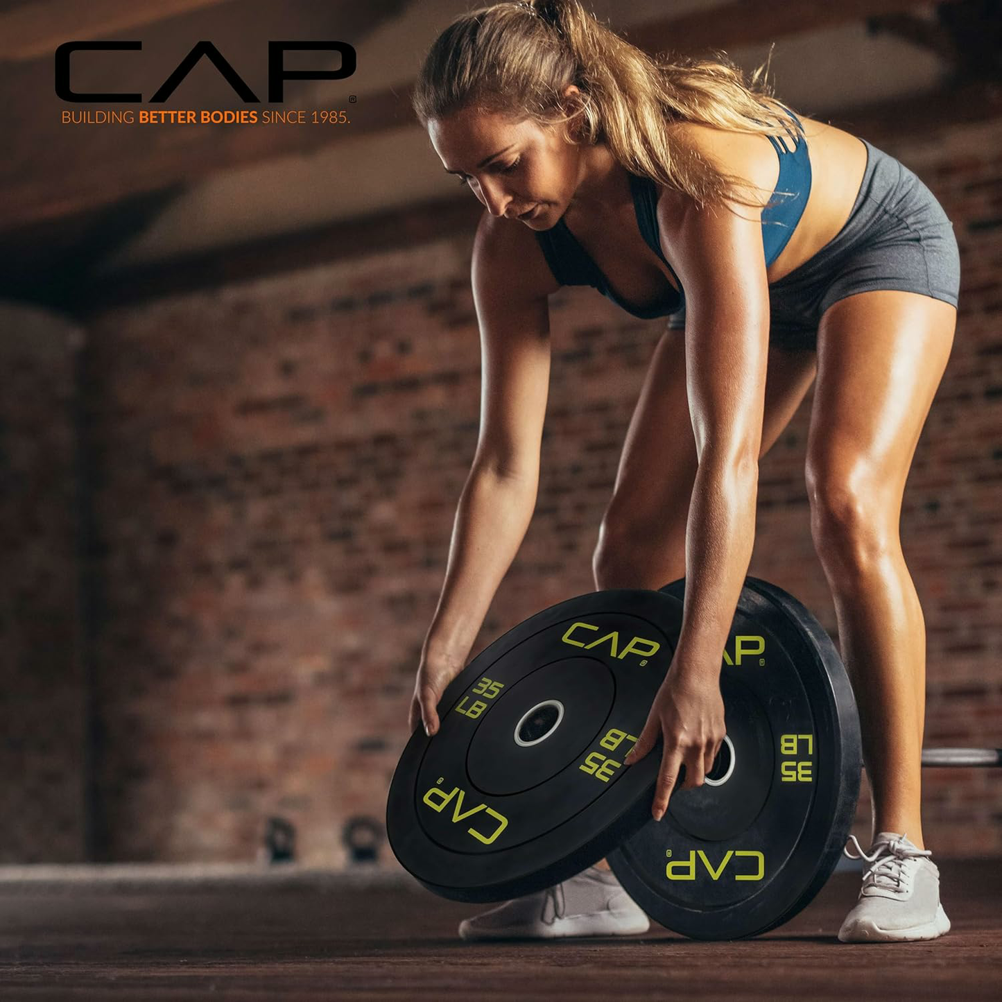 2-inch Olympic Bumper Plate Weight Set | 100-370 lbs | Multiple Colors | Storage Rack Optional